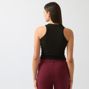 Cavvalure Black women's equestrian tank top – back view on model
