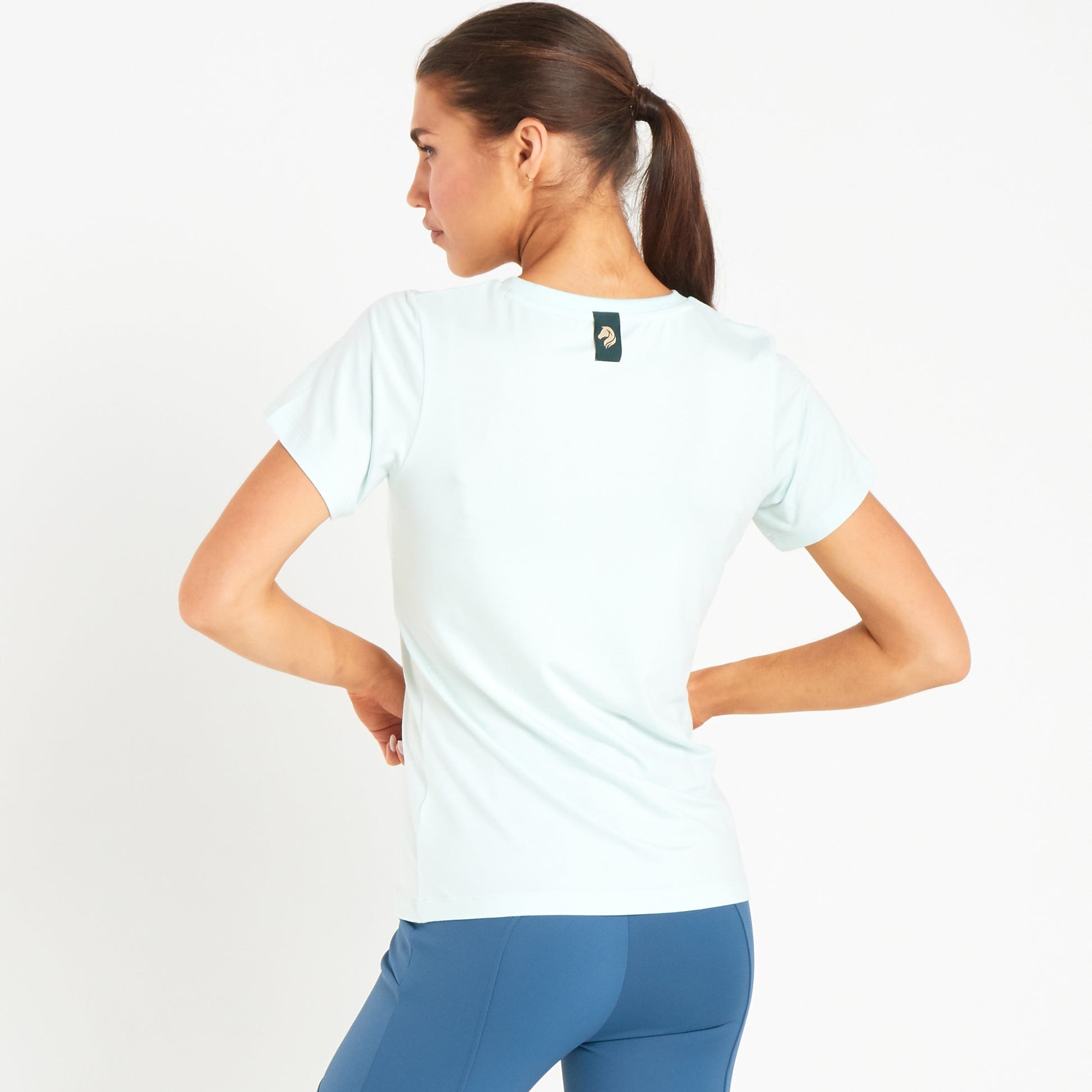 Cavvalure Olive Dust bamboo equestrian T-shirt – back view on model