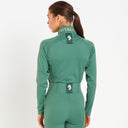 Cavvalure Hunting Green women's equestrian base layer – back view on model