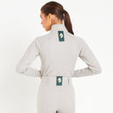 Cavvalure Mink women's equestrian base layer – back view on model